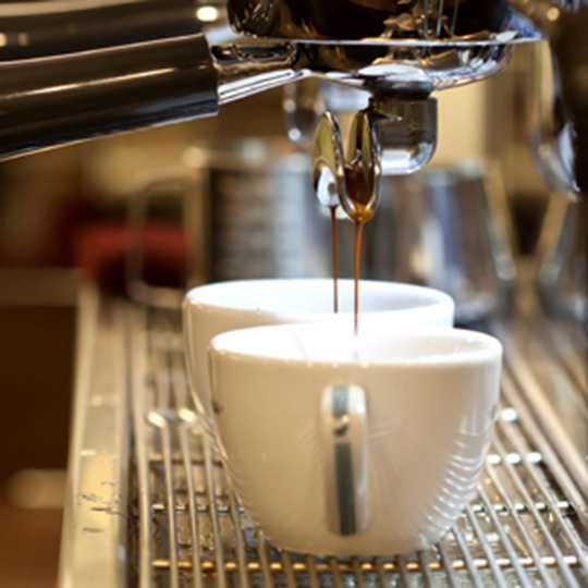 Coffee machine making coffee