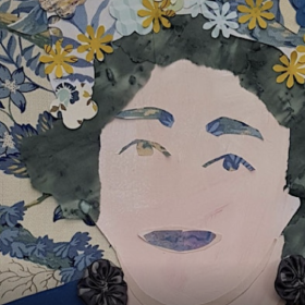 Painting of a woman's face framed by coloured cutout paper flowers