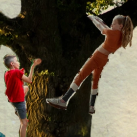 Two children climb a tree