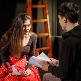 Young actors rehearsing a play