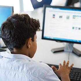 Young boy using computer