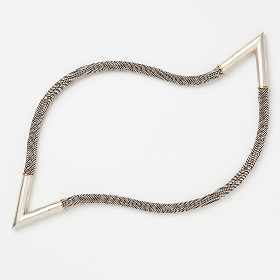 Photo of a silver jewellery piece with white background