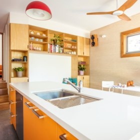 Interior of modern home showing stairs and kitchen