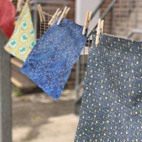 Blue and yellow cloth hanging on a line