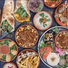 A range of Egyptian foods spread out on table