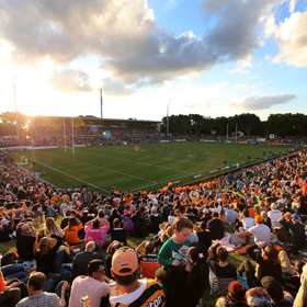 View of crowd looking over field at Leichhardt Oval