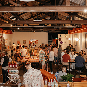 a crowd of people in a bar