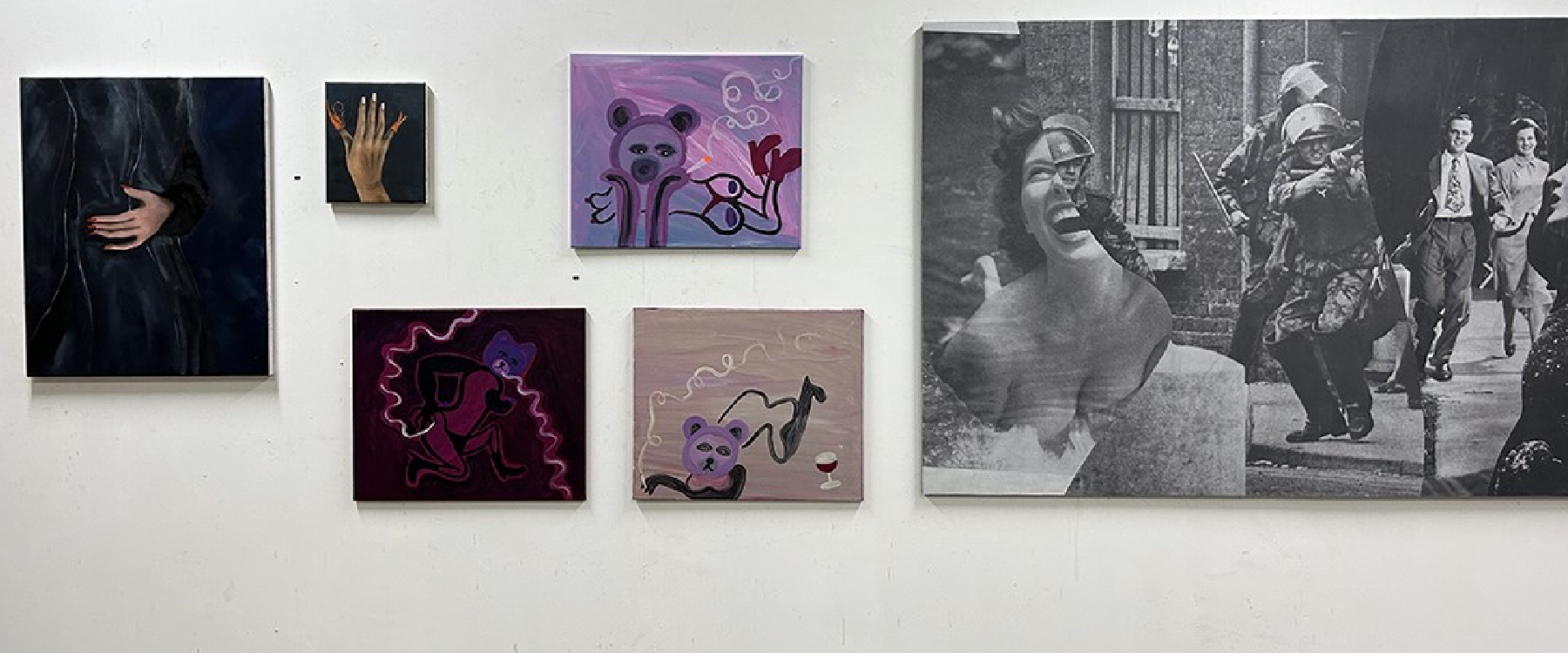 Various artworks by Alessia Britti, Paige Gleeson and Steve Tierney, from L-R the fisrt two paintings are of hands with nail polish and embelishments, the next three painitings are of a teddy bear like character painted in pinks and purples, the last is a collaage of conflicting black and white photos, a woman laughing, soilders pointing guns and a happy couple walking on the street